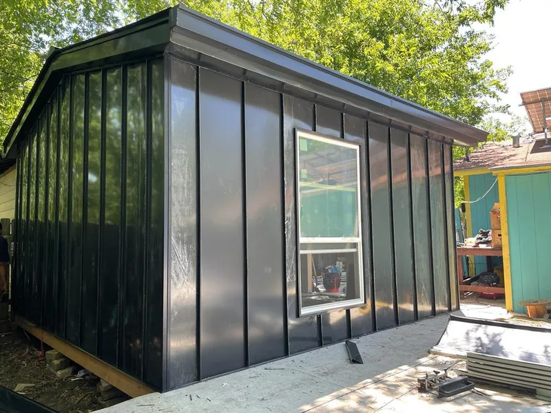 Black standing seam metal wall panels for Metal Roof Installation in Stonecrest