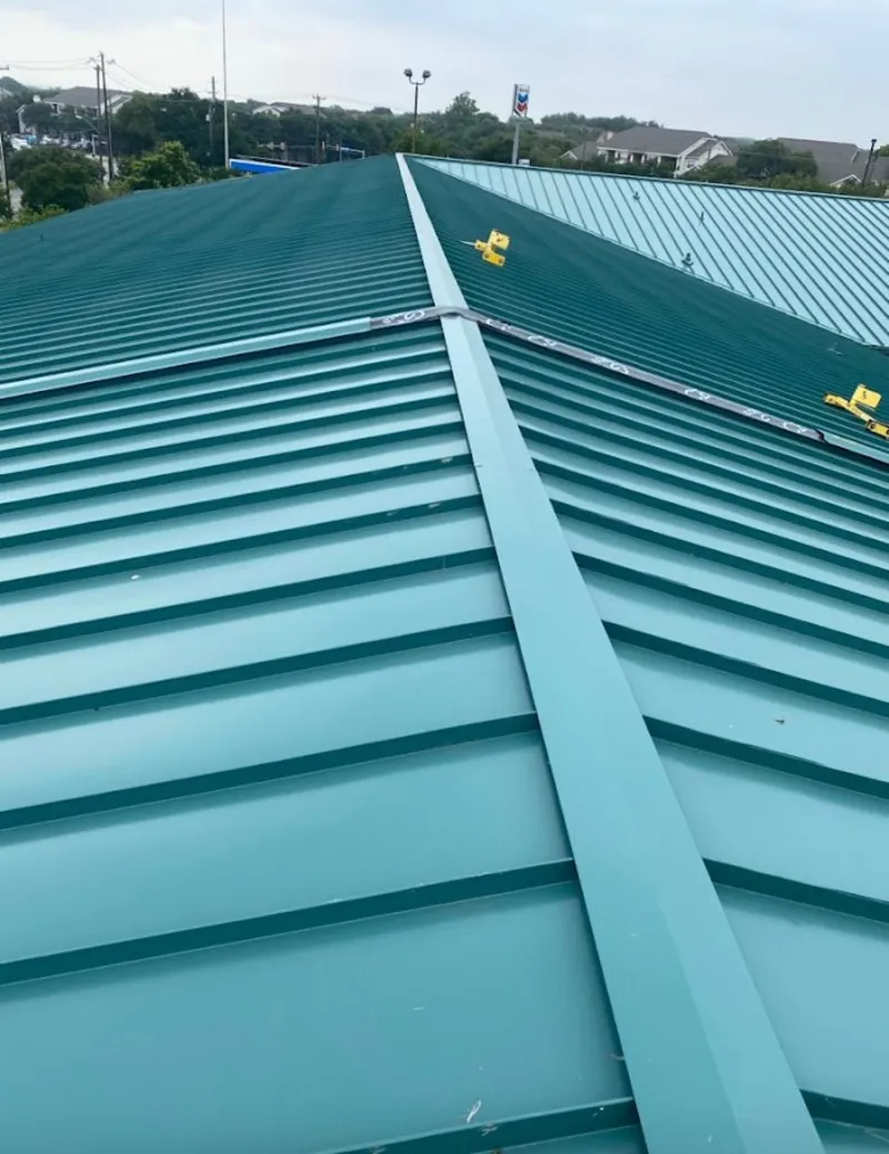 Green commercial metal roof ridge and valley for Metal Roof Repair in Stonecrest